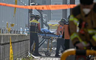 韩国工厂大火 遇难者多为中国女工